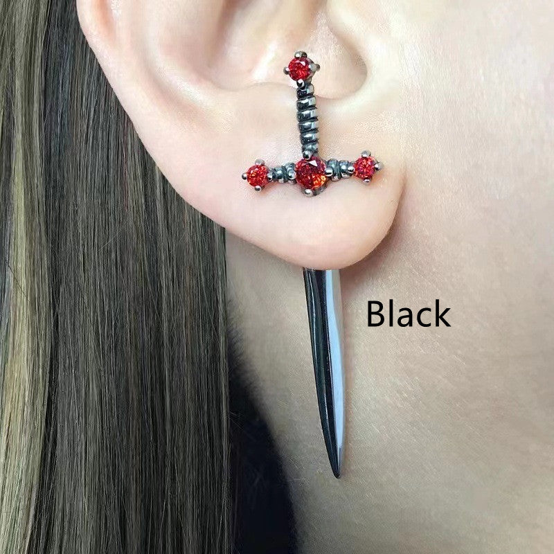 Dagger earrings, statement earrings, edgy jewelry, bold earrings, gold earrings, silver earrings, black earrings, fashion earrings, unique earrings.