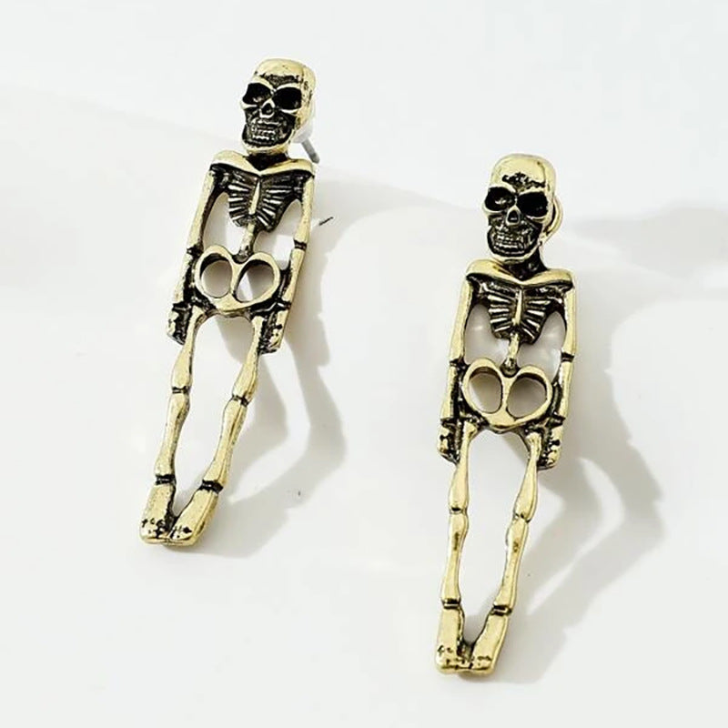 Halloween earrings, skull earrings, skull stud earrings, Halloween jewelry, goth earrings, spooky earrings, gothic jewelry, Halloween costume jewelry, statement earrings, Halloween accessories.