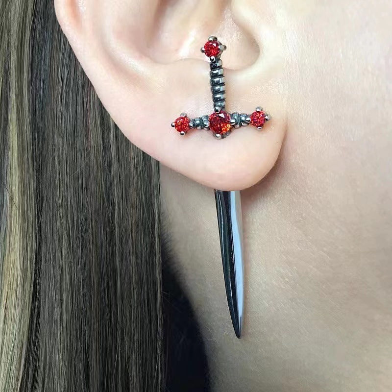 Dagger earrings, statement earrings, edgy jewelry, bold earrings, gold earrings, silver earrings, black earrings, fashion earrings, unique earrings. 