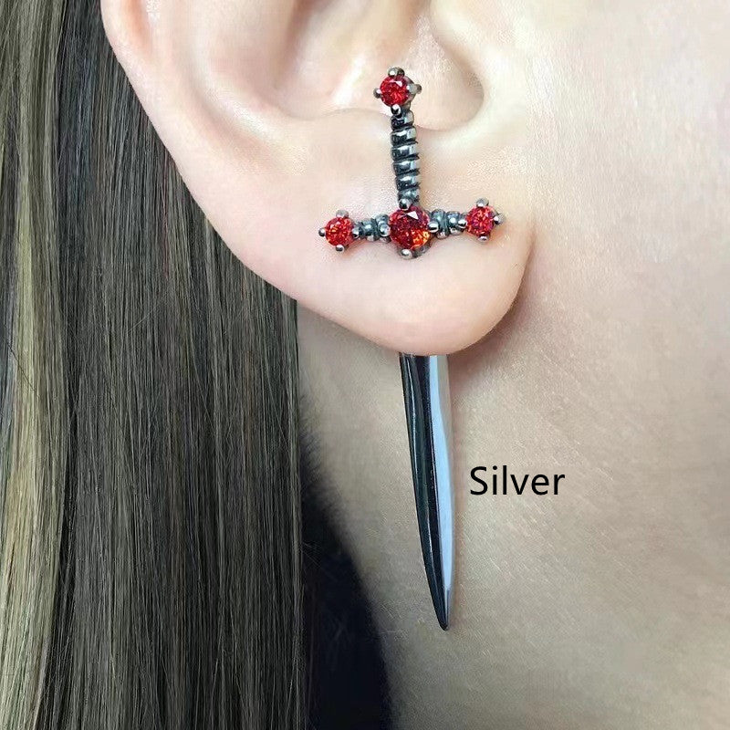 Dagger earrings, statement earrings, edgy jewelry, bold earrings, gold earrings, silver earrings, black earrings, fashion earrings, unique earrings. 