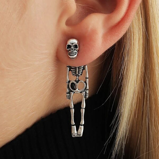 Halloween earrings, skull earrings, skull stud earrings, Halloween jewelry, goth earrings, spooky earrings, gothic jewelry, Halloween costume jewelry, statement earrings, Halloween accessories.