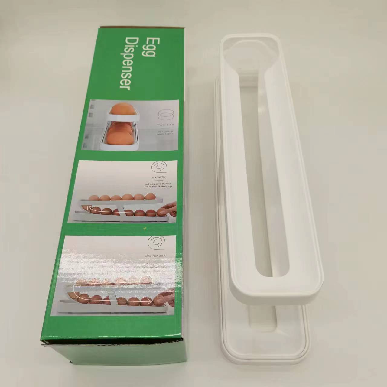  Everything Unique's Automatic Rolling Egg Dispenser on a countertop, showcasing its compact design and stylish look.